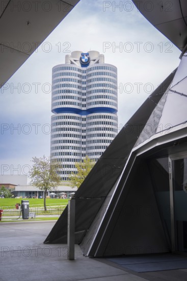 Striking high-rise building in modern architecture, perspective shot through entrance area, BMW Welt, Munich, Germany