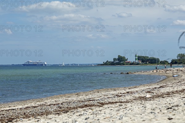 Beach, lighthouse Bülk, Color Line ship, sailing boats, Strande, Schleswig-Holstein, Germany