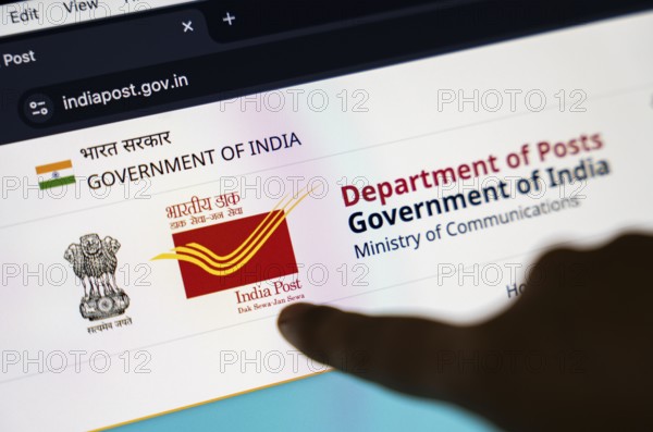 New Delhi, India – August 23, 2025: In this photo illustration, the India Post logo is seen on a digital display. The Indian Department of Posts has announced a temporary suspension of most postal services to the United States from Aug 25