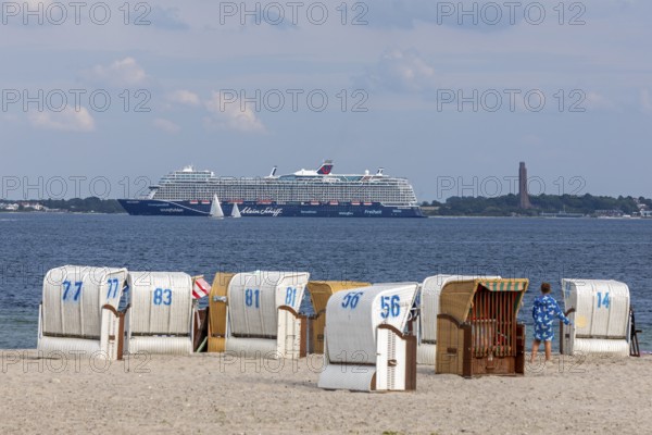 Cruise ship Mein Schiff 7, Laboe Naval Memorial, Kiel Fjord, beach chairs on the beach at Strande, Schleswig-Holstein, Germany