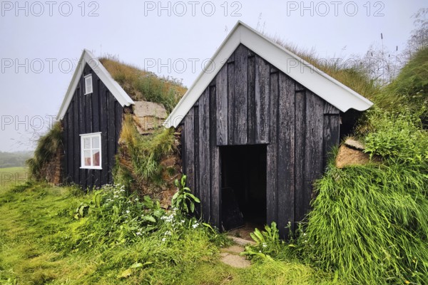 Nyibær, a medium-sized farmhouse with a sod roof, now a museum, Holar, Iceland
