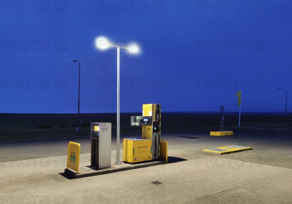 Petrol station vending machine with self-service day and night in rural surroundings in the evening, Laugarbakki, Northwest Iceland, Iceland