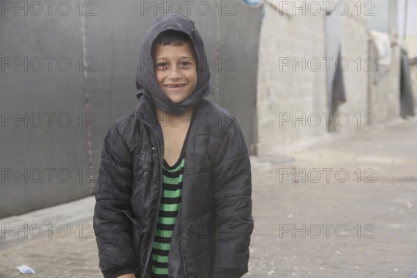 Syrian children playing in a refugee camp near the Turkish border on World Children's Day. Aleppo, Syria March 2, 2017, Aleppo, Syria