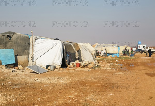 Worn-out tents housing Syrian refugees near the Turkish border, showing the dire humanitarian conditions in which displaced people are forced to live. Aleppo, Syria. January 26, 2023, Aleppo, Syria