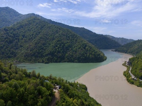 Two rivers meet, surrounded by forested mountains and blue sky, aerial view, confluence of Adjariszqali and Khorokhi, Adjaris-Tsqali, Adjaris-Tsqali, Autonomous Republic of Adjara, Lesser Caucasus, Georgia
