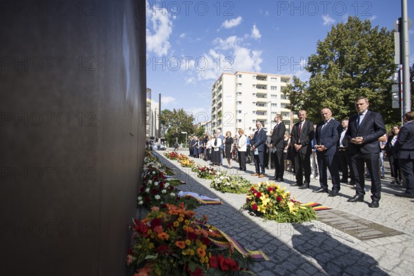 Prof. Dr Axel Klausmeier (Director of the Berlin Wall Foundation and art historian), Kai Wegner (Governing Mayor of Berlin) and other participants at a wreath-laying ceremony to commemorate the division of the city from 13 August 1961 to 9 November 1989 and to remember the victims of tyranny at the Bernauer Strasse Memorial, Berlin, 13.08.2025