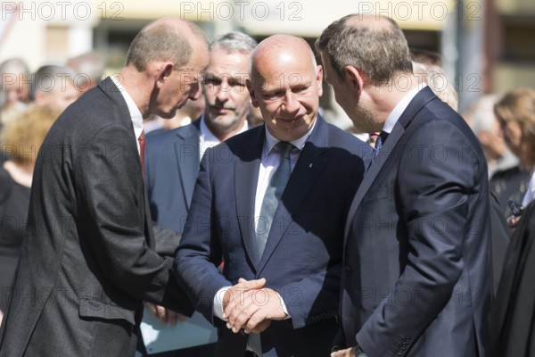 Kai Wegner (Governing Mayor of Berlin) in conversation after a wreath-laying ceremony to commemorate the division of the city from 13 August 1961 to 9 November 1989 and to remember the victims of tyranny at the Bernauer Strasse memorial, Berlin, 13.08.2025