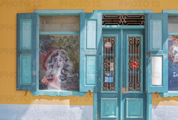 Painted outdoor cafe window, Gialos, Symi Island, Dodecanese Islands, Greece