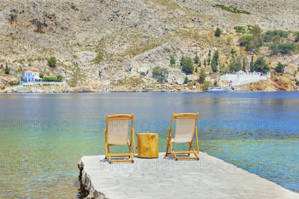 Path leading to the turquoise waters of Nimborio Beach, Nimborio, Symi Island, Dodecanese Islands, Greece