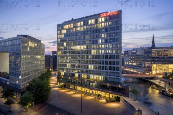 Aerial view of the Spiegel building at Ericusspitze in Hamburg's HafenCity in the Brooktorkai neighbourhood at blue hour, Hamburg, Germany