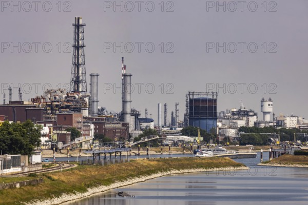 BASF in Ludwigshafen with Rhine and cargo ship. Ludwigshafen, Rhineland-Palatinate, Germany