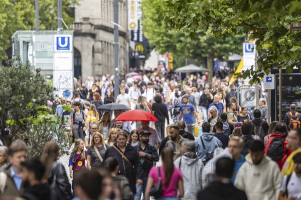 Crowd on the way in the shopping street. Königstraße pedestrian zone in Stuttgart, Baden-Württemberg, Germany
