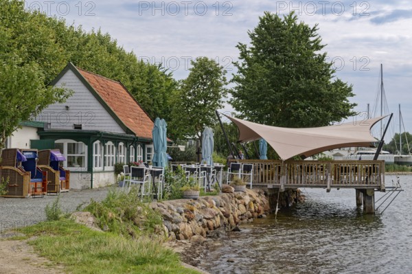 Restaurant Strandhalle on the banks of the Schlei in the town of Arnis, the smallest town in Germany. Arnis, Schleswig-Holstein, Germany