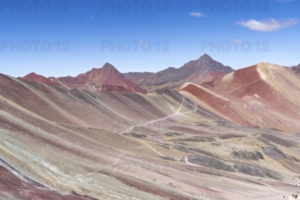 Vinicunca, colourful mountains in the background, in the Peruvian Andes, Cusipata district, Cusco, Peru