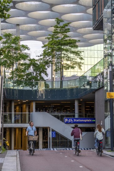 Entrance and exit to the central bicycle car park at Stationsplein, the largest bicycle car park in the world with over 13, 000 parking spaces on 3 floors, directly under the central station, Utrecht Centraal, Netherlands