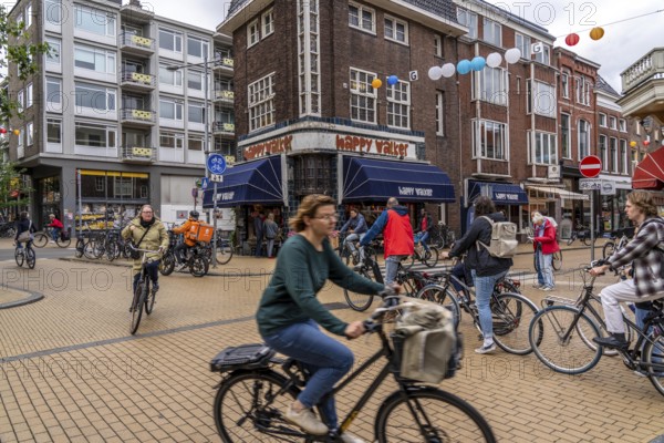 Cycling in the city centre of Groningen, old town, Netherlands