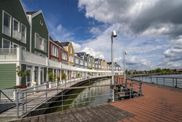 Small town of Houten near Utrecht, bicycles have priority in the town of 50, 000 inhabitants, generous cycle paths, many leisure areas, water areas, living by the water