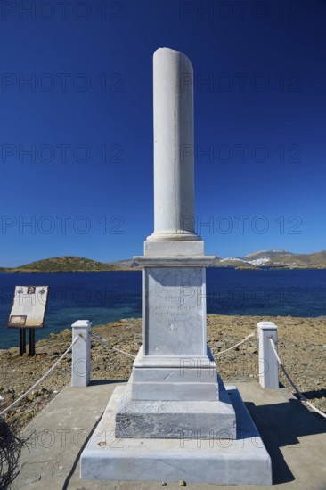 Monument, Hippolyte Bisson, A tall white column stands under a blue sky overlooking the sea, Analipsi, Maltezana, Astypalea, Astipalea, Astipaleia, Dodecanese, Greek Islands, Greece