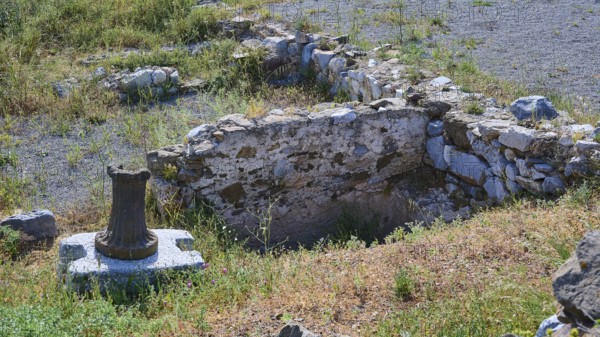 Ancient ruins with preserved column on a stone block in the surroundings of a historical site, ancient Roman bath, Tallaras, Analipsi, Maltezana, Astypalea, Astipalea, Astipaleia, Dodecanese, Greek Islands, Greece