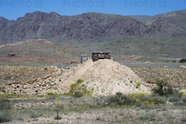 Abandoned-looking bunker on a hill in a mountainous landscape, embrasure on the border to the Azerbaijani enclave of Nakhchivan, Nakhchivan, M2, Armenia