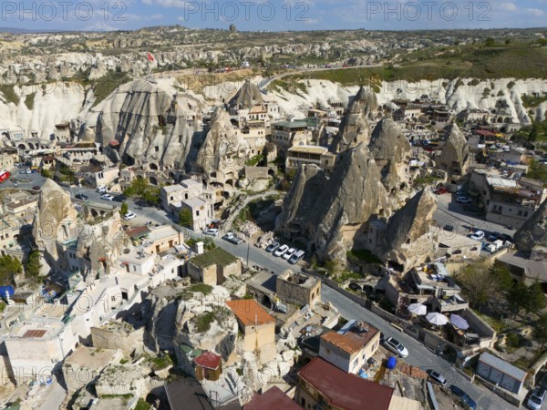 Lively city with unique architecture nestled between striking rock formations, aerial view, Göreme, Göreme National Park, Göreme Tarihî Millî Parki, Nevsehir province, Nevsehir, Cappadocia, Cappadocia, Kapadokya, Cappadocia, Central Anatolia, Turkey