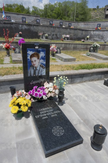Single grave with portrait and floral decoration, memorial, grave of 2020, victim of the war between Armenia and Azerbaijan, cemetery, Sisian, Sissian, Sjunik province, historical Sangesur, Armenia