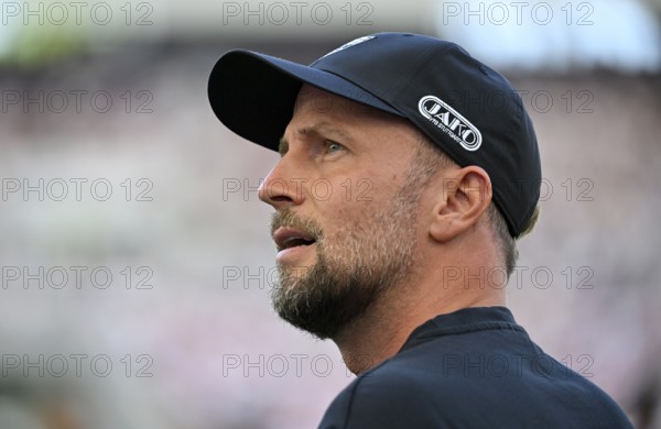 Coach Sebastian Hoeneß VfB Stuttgart Portrait MHPArena, JAKO Logo MHP Arena Stuttgart, Baden-Württemberg, Germany