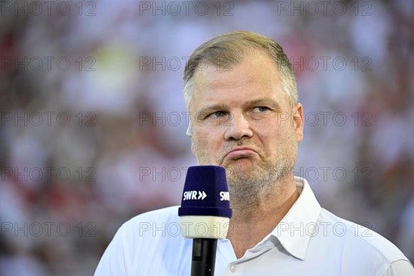 Board Member for Sport Fabian Wohlgemuth VfB Stuttgart Portrait in interview Microphone Microphone Logo SWR sceptical thoughtful Gesture Gesture MHPArena, MHP Arena Stuttgart, Baden-Württemberg, Germany
