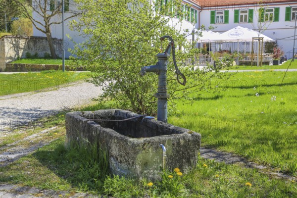 Fountain, stone basin with hand pump, water dispenser, behind Gestütsgasthof, near the Lauterquelle, municipality of Gomadingen, Swabian Alb, Baden-Württemberg, Germany