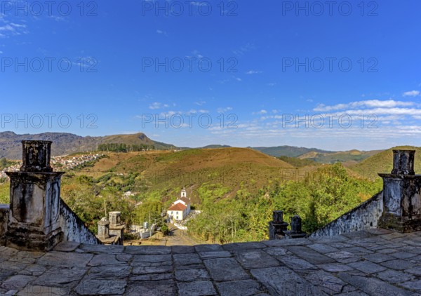 Old stone buildings and a church on the hills of the city of Ouro Preto in Minas Gerais, Ouro Preto, Minas Gerais, Brazil