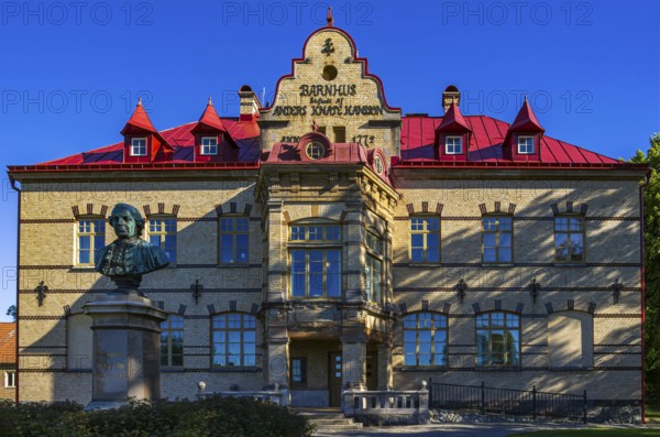 Historic school building of Gustafsberg, a former spa and bathing resort on the Byfjord in Uddevalla, Bohuslän, Västra Götalands län, Sweden, digitally reworked