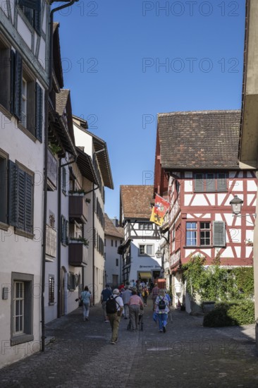 Old town alley with historic half-timbered houses with tourists, Stein am Rhein, Canton Schaffhausen