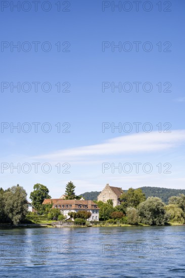 View over the Rhine, Hochrhein to the historic Bibermühle mill near Rheinklingen, Canton Thurgau, Switzerland