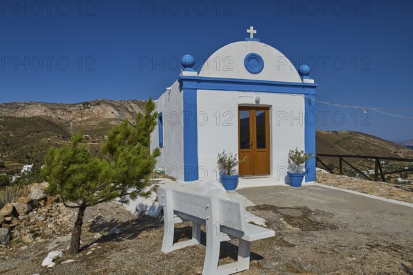 White chapel with blue roof and cross, visible in mountainous, clear surroundings, Panagia tou Paleokastro, Church of the Old Fortress, Chapel, Panagia Kasteli, Lepides, Leros, Dodecanese, Greek Islands, Greece
