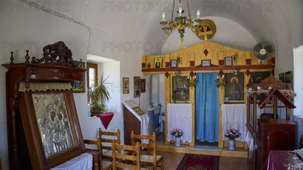 Cosy sacred interior with Orthodox icons and ornate wooden altar, Panagia tou Paleokastro, Church of the Old Fortress, Chapel, Panagia Kasteli, Lepides, Leros, Dodecanese, Greek Islands, Greece