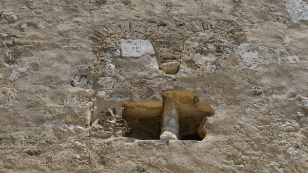 Close-up of a historic stone wall with rustic details, built-in antique column, basilica, church, Agios Theologos, Leros, Dodecanese, Greek Islands, Greece