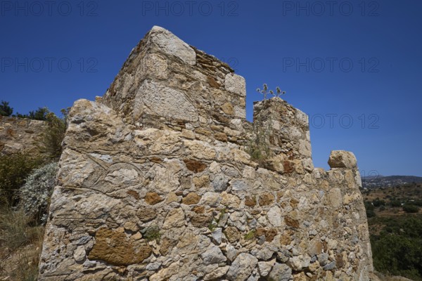 Old stone ruins in a Mediterranean landscape under a clear sky with sparse vegetation, Panagia tou Paleokastro, Church of the Old Fortress, Chapel, Panagia Kasteli, Lepides, Leros, Dodecanese, Greek Islands, Greece