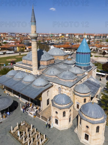 Detailed mosque with decorated dome and minaret in the background of the city view, aerial view, Mevlânâ Museum, Mevlana, landmark, mausoleum of Mevlânâ Dschalal ad-Din Rumi, Konya, Central Anatolia, Turkey