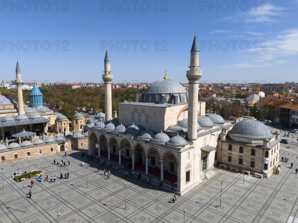 Spacious mosque complex with wide squares and several minarets under a clear sky, aerial view, Mevlânâ Museum, Mevlana, landmark, mausoleum of Mevlânâ Dschalal ad-Din Rumi, Konya Sultan Selim Camii, Konya, Central Anatolia, Turkey