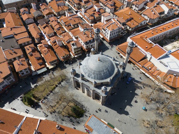 Central mosque surrounded by historic buildings with red tiled roofs, aerial view, Aziziye Camii, Konya, Central Anatolia, Turkey