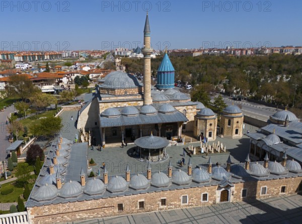 The Mevlana Museum in Konya with its characteristic blue domes and minaret on a sunny day, aerial view, Mevlânâ Museum, Mevlana, landmark, Mausoleum of Mevlânâ Jalal ad-Din Rumi, Konya, Central Anatolia, Turkey