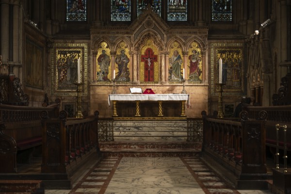 Detailed church altar surrounded by candles, St Mary Abbot Church, Kensington, London, England, Great Britain