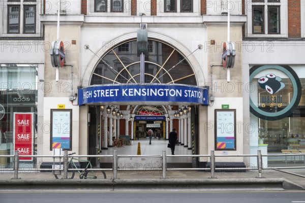 Entrance to High Street Kensington underground station in an urban environment, Kensington, London, England, United Kingdom