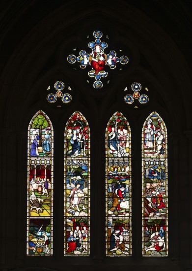 Stained glass window with religious depictions and bright colours, St. Mary Abbot Church, Kensington, London, England, Great Britain
