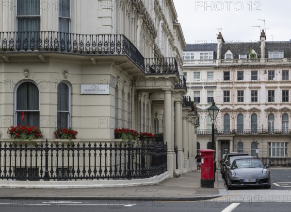 Urban scene with neoclassical buildings, Prince of Wales Terrace, Kensington, London, England, United Kingdom