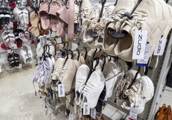 Shoes display at Zudio store in Guwahati, India, during a monsoon season sale on August 1, 2025