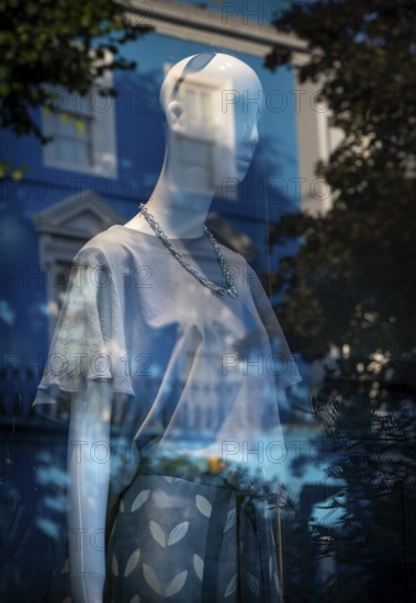 Mannequin, reflection in shop window, Portobello Road, Notting Hill, London, England, Great Britain