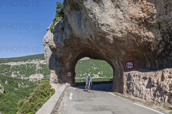 Road and rock arch, Gorges de la Nesque, Vaucluse, Provence-Alpes-Cote dAzur, South of France, France