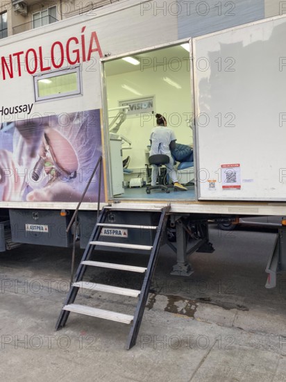 Mobile dental practice in a lorry, free dental treatment in Buenos Aires, Argentina