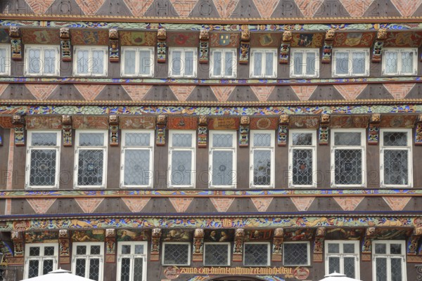 Decorations on the historic bone-cutters' office building built in 1529, bone-cutters, office building, arts and crafts, wood carvings, painting, wooden beams, market square, Hildesheim, Lower Saxony, Germany